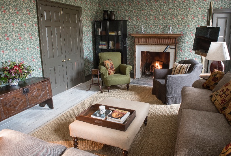 The living room in Rock House is cosy and inviting.