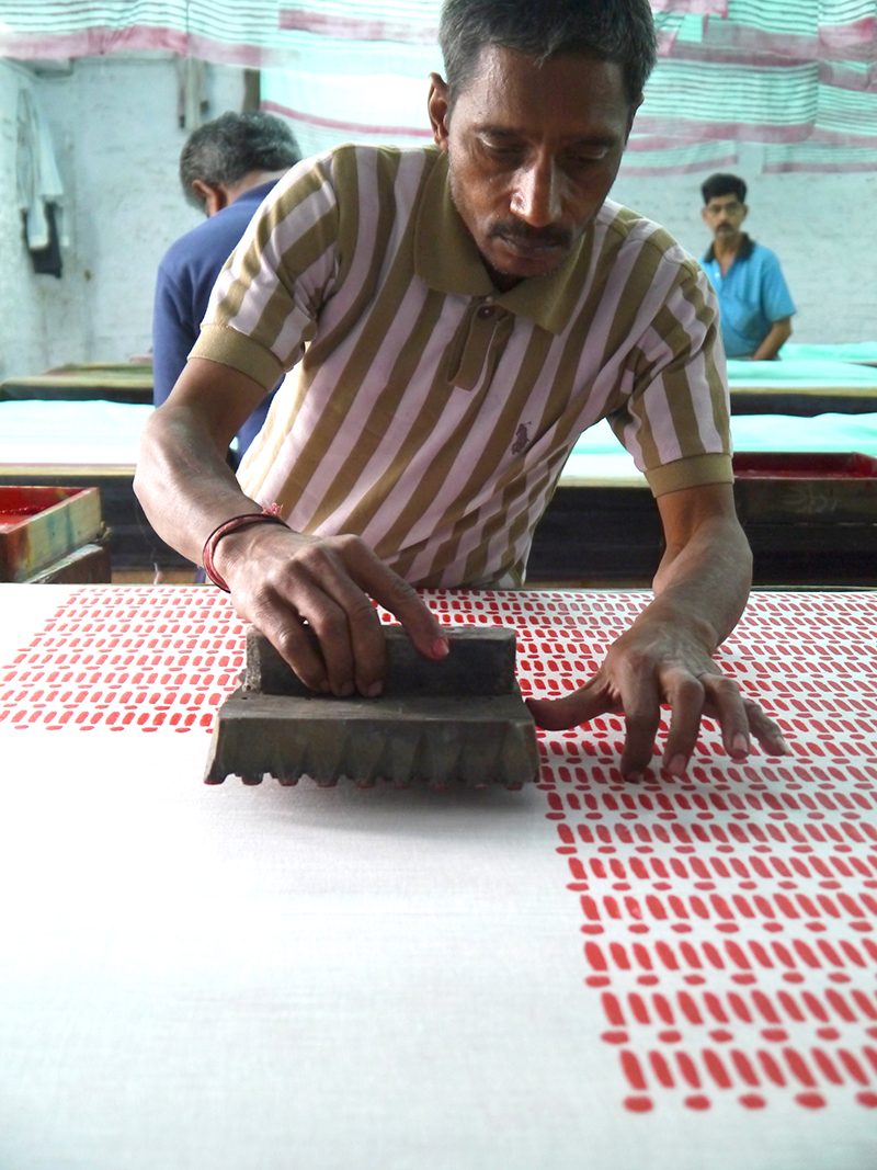 Traditional block printing with a beautiful pattern emerging.