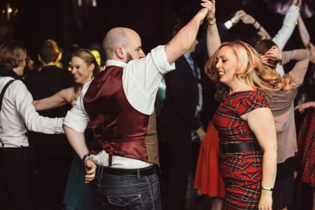 PHoto of people dancing at a ceilidh