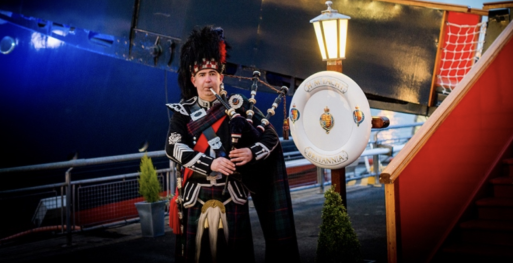 Man playing bagpipes aboard the Royal Yacht Britannia